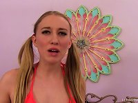 Bikini-clad teen whore with pigtails sucking a stranger's cock